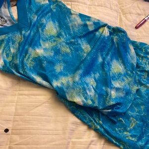 Size small .Comfortable biker shorts underneath comfortable skirt-matching top.